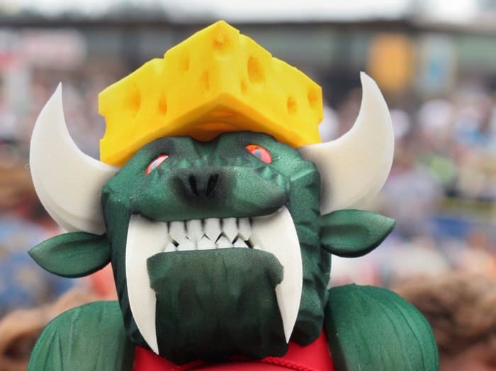 A Hodag still manages to look fierce with cheese on its head.